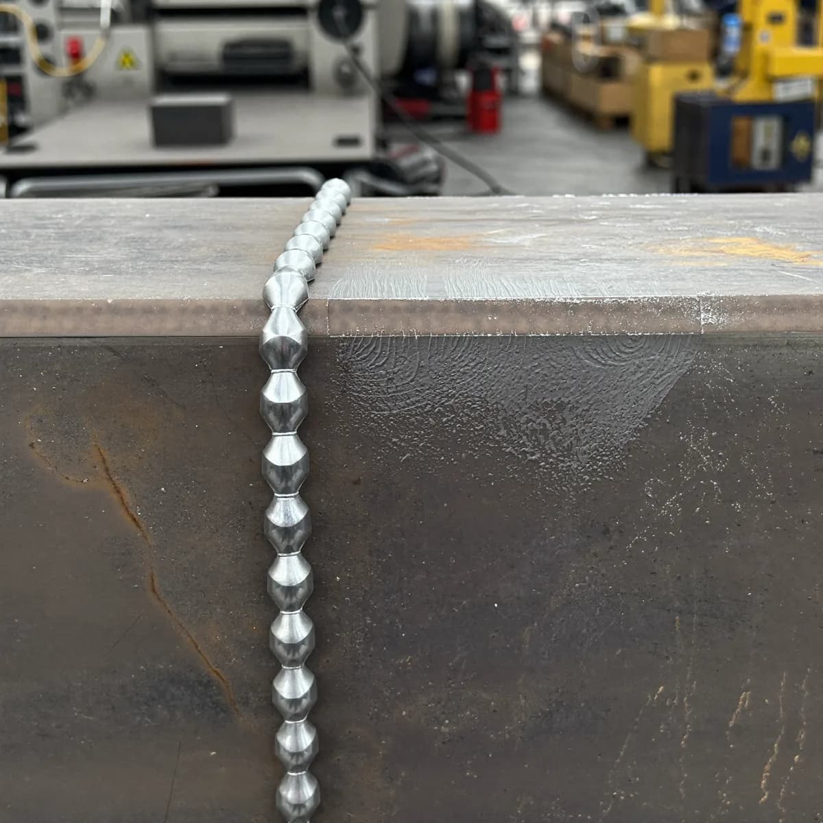 A finished weld bead along a structural joint