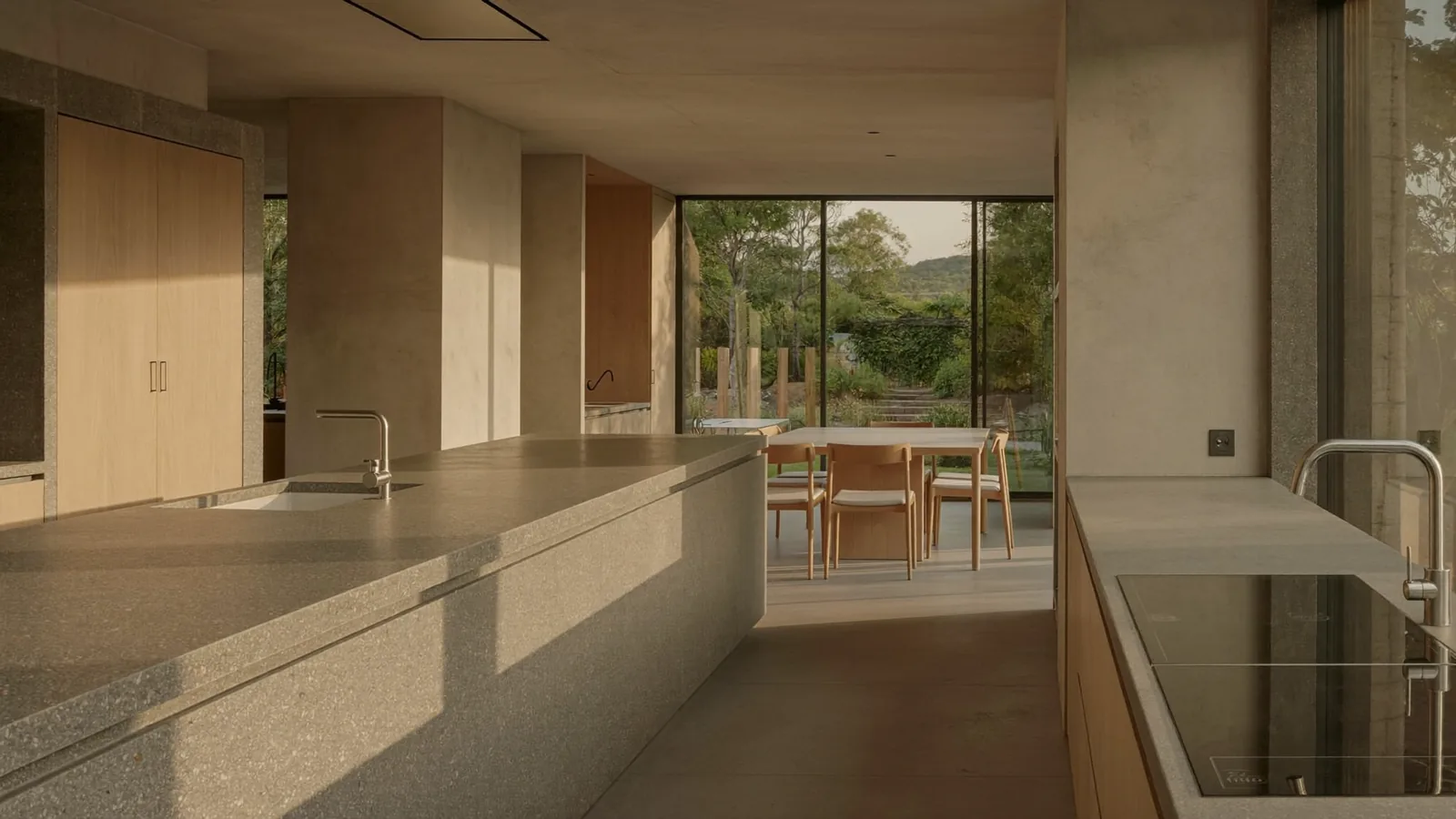 The open kitchen and dining area of a finished residence