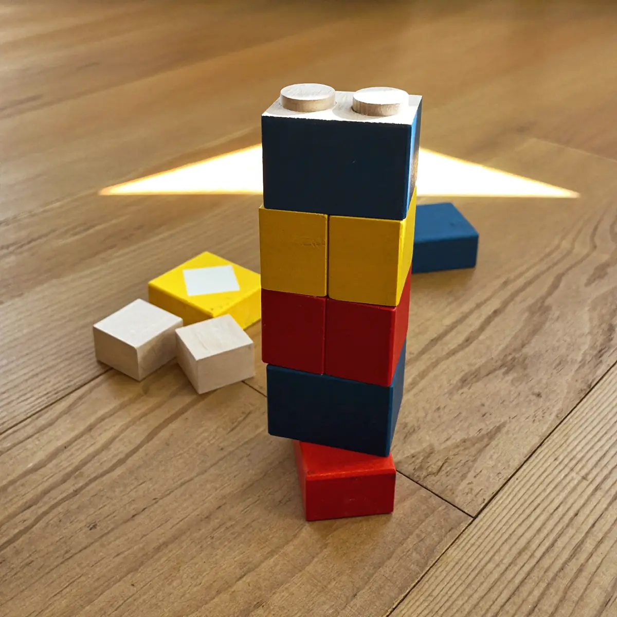 Wooden blocks stacked on the classroom floor