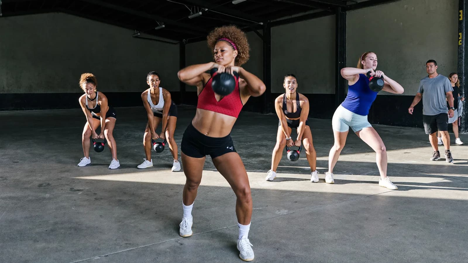 A group class working through a set together